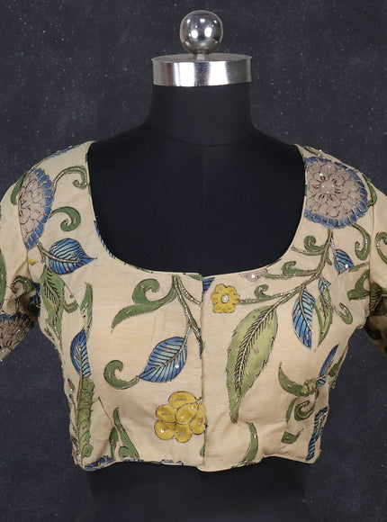 Silk penkalamkari readymade blouse cream with allover kalamkari prints & pita work and back knot