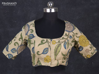 Silk penkalamkari readymade blouse cream with allover kalamkari prints & pita work and back knot