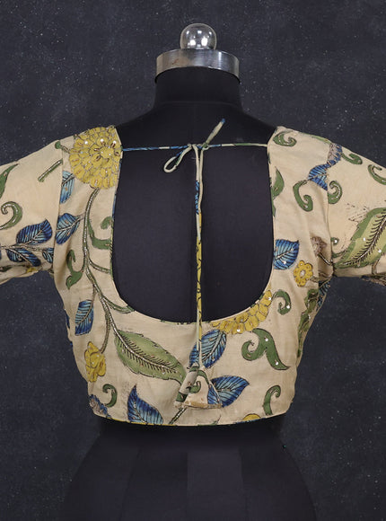Silk penkalamkari readymade blouse cream with allover kalamkari prints & pita work and back knot