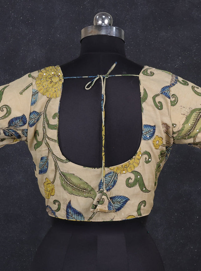 Silk penkalamkari readymade blouse cream with allover kalamkari prints & pita work and back knot