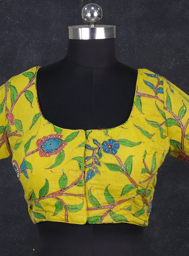 Silk penkalamkari readymade blouse lime yellow with allover kalamkari prints & pita work and back knot