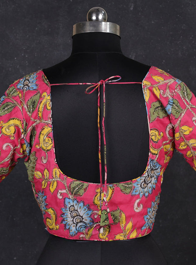 Silk penkalamkari readymade blouse pink with allover kalamkari prints & pita work and back knot