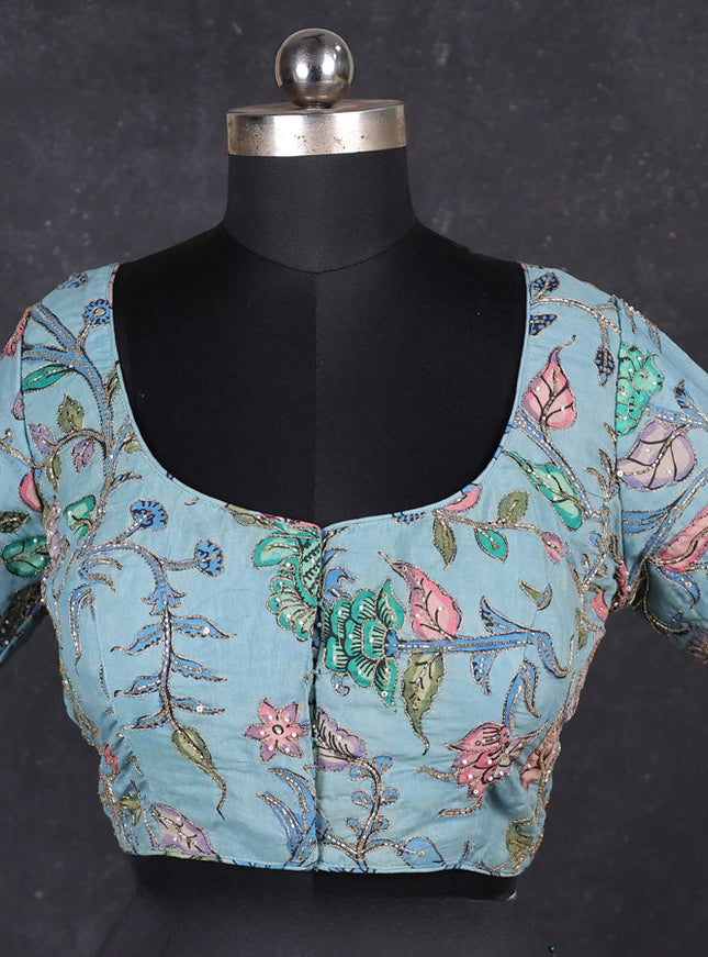 Silk penkalamkari readymade blouse teal blue with allover kalamkari prints & pita work and back knot