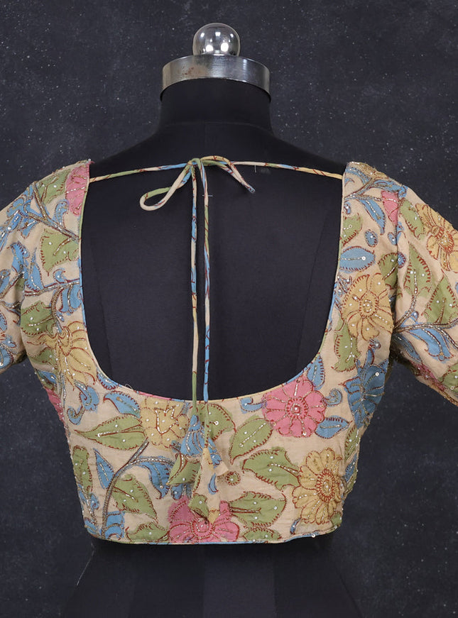 Silk penkalamkari readymade blouse cream with allover kalamkari prints & pita work and back knot