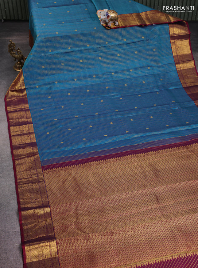 Pure kanchipuram silk saree cs blue and maroon with allover zari checks & buttas and zari woven border
