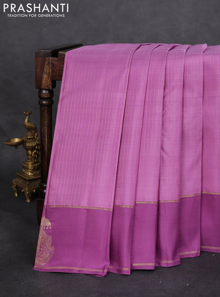 Pure kanchipuram silk saree lavender and purple shade with allover zari woven stripes pattern and zari woven butta border