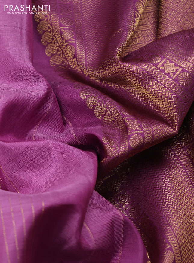 Pure kanchipuram silk saree lavender and purple shade with allover zari woven stripes pattern and zari woven butta border