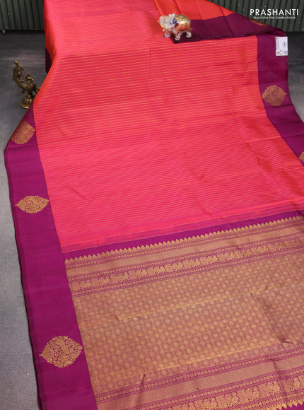 Pure kanchipuram silk saree dual shade of pinkish orange and magenta pink with allover zari woven stripes pattern and zari woven butta border