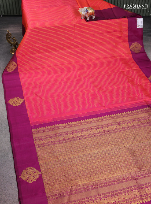 Pure kanchipuram silk saree dual shade of pinkish orange and magenta pink with allover zari woven stripes pattern and zari woven butta border