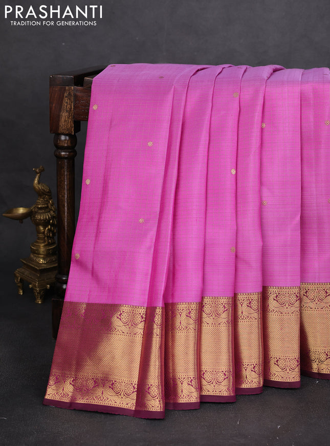Pure kanchipuram silk saree lotus pink and dark magenta pink with allover zari checks & buttas and zari woven border