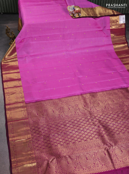 Pure kanchipuram silk saree lotus pink and dark magenta pink with allover zari checks & buttas and zari woven border
