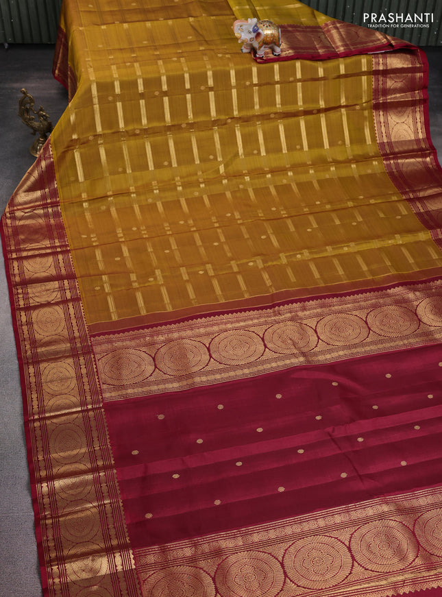 Pure kanchipuram silk saree mustard green and maroon with allover zari weaves & buttas and zari woven border