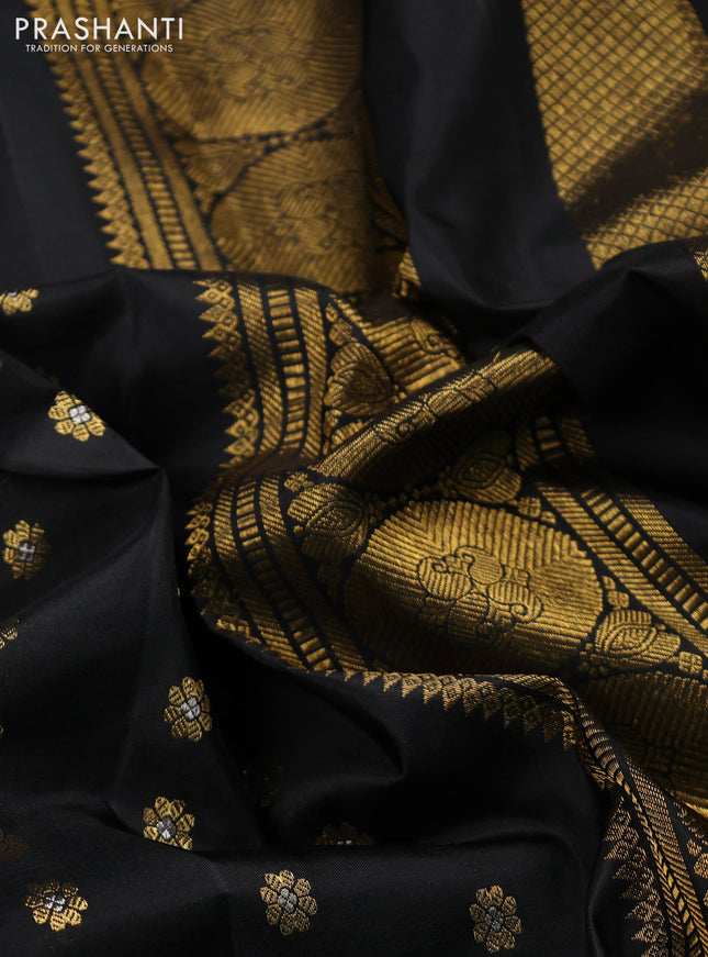 Pure kanchipuram silk saree black with allover zari woven floral buttas and rettapet zari woven border