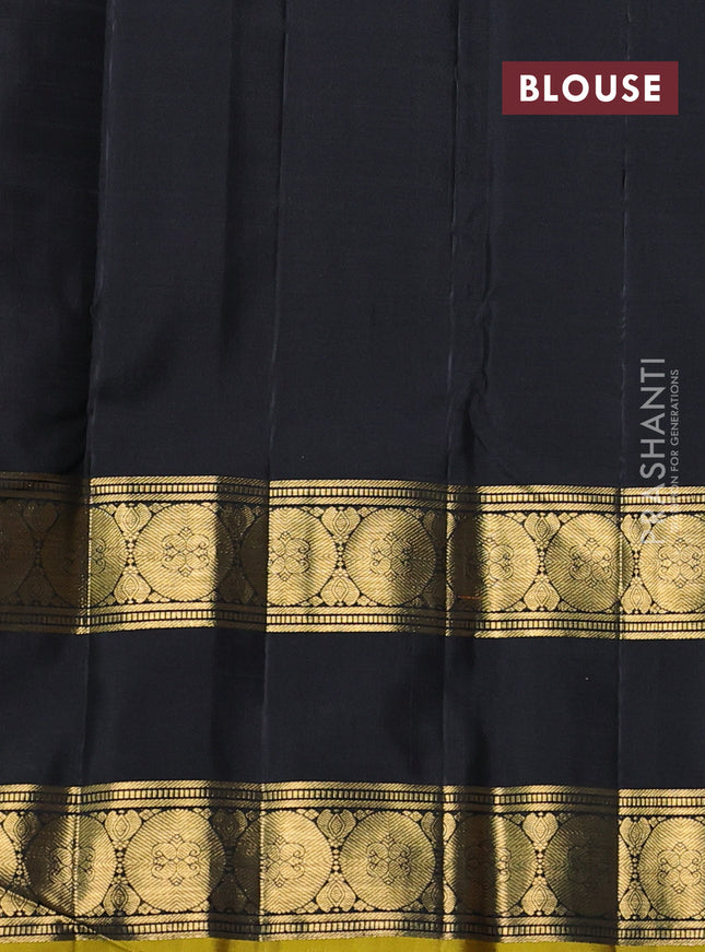 Pure kanchipuram silk saree black with allover zari woven floral buttas and rettapet zari woven border
