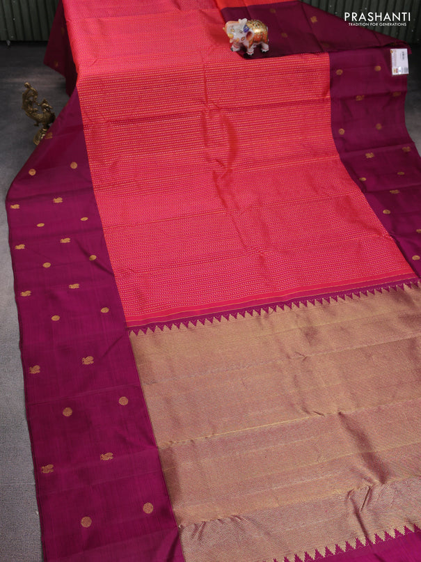 Pure kanchipuram silk saree dual shade of pinkish orange and dark magenta pink with allover silver & gold zari weaves and zari woven butta border