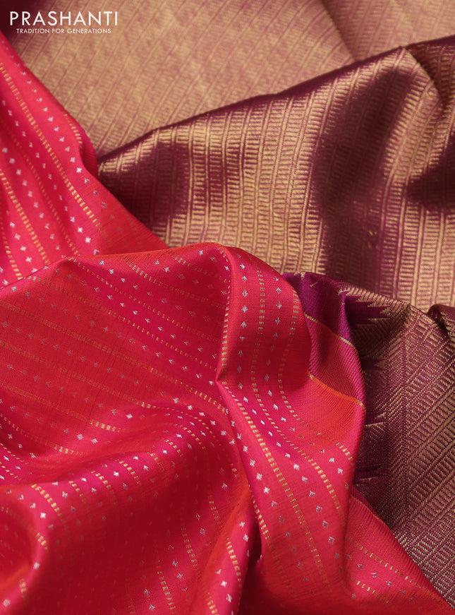 Pure kanchipuram silk saree dual shade of pinkish orange and dark magenta pink with allover silver & gold zari weaves and zari woven butta border