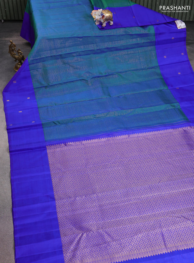 Pure kanchipuram silk saree dual shade of bluish green and royal blue with allover zari checks and zari woven butta border