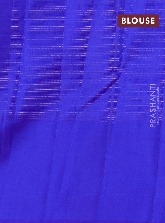 Pure kanchipuram silk saree dual shade of bluish green and royal blue with allover zari checks and zari woven butta border