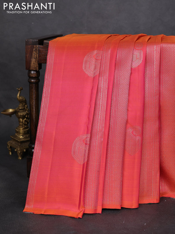 Pure kanchipuram silk saree dual shade of pinkish orange and dark green with allover zari weaves & buttas in borderless style