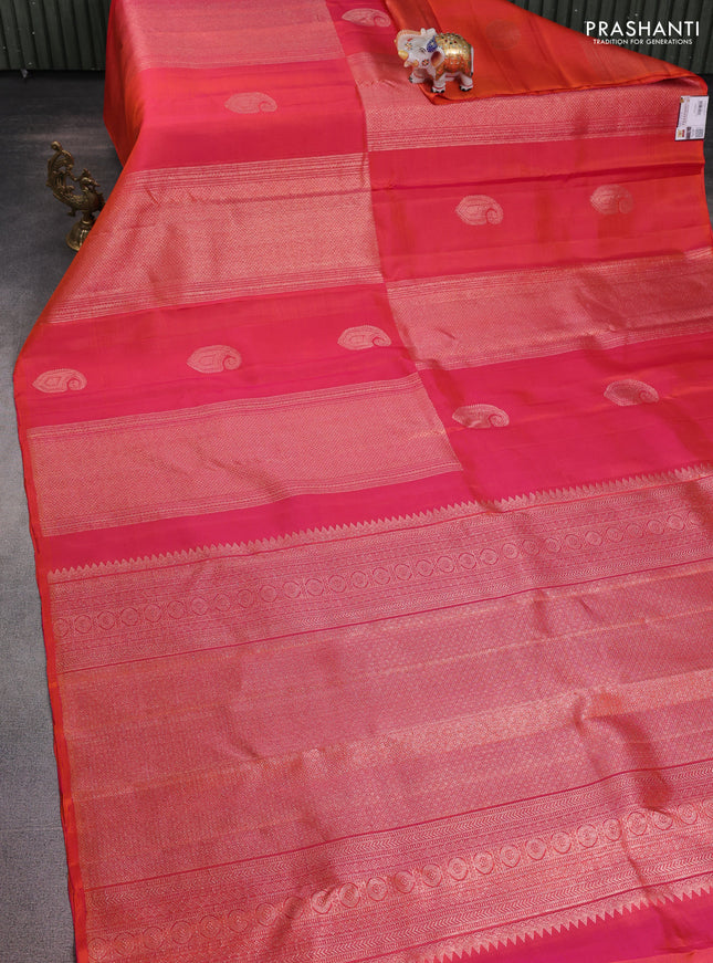 Pure kanchipuram silk saree dual shade of pinkish orange and dark green with allover zari weaves & buttas in borderless style