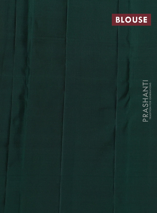 Pure kanchipuram silk saree dual shade of pinkish orange and dark green with allover zari weaves & buttas in borderless style