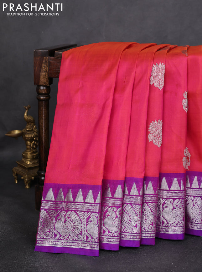 Venkatagiri silk saree dual shade of pinkish orange and purple with silver zari woven buttas and silver zari woven border