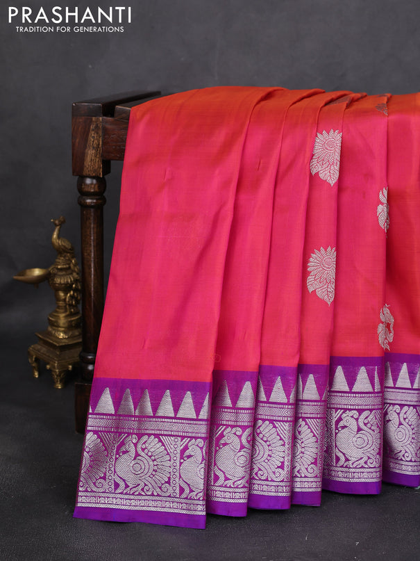 Venkatagiri silk saree dual shade of pinkish orange and purple with silver zari woven buttas and silver zari woven border