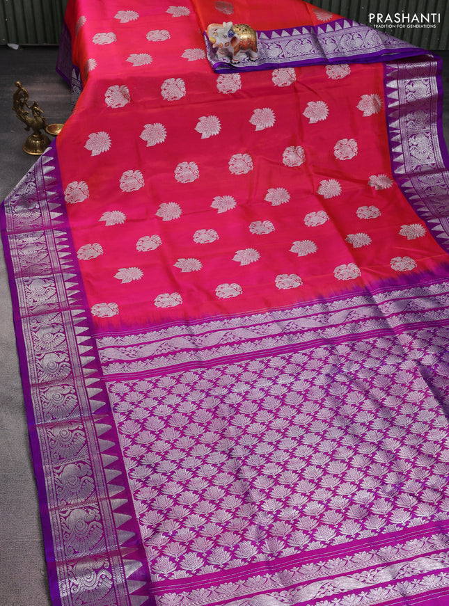 Venkatagiri silk saree dual shade of pinkish orange and purple with silver zari woven buttas and silver zari woven border