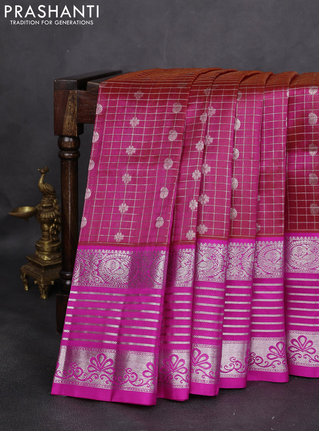 Venkatagiri silk saree dual shade of pinkish orange and pink with allover silver zari checks & buttas and long silver zari woven border