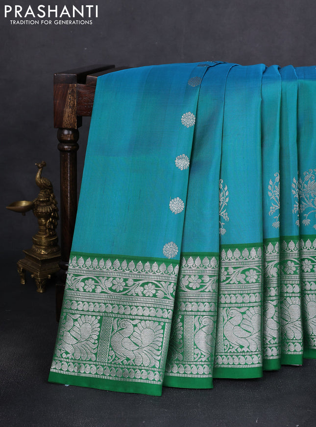 Venkatagiri silk saree dual shade of teal blue and green with silver zari woven buttas and long silver zari woven border