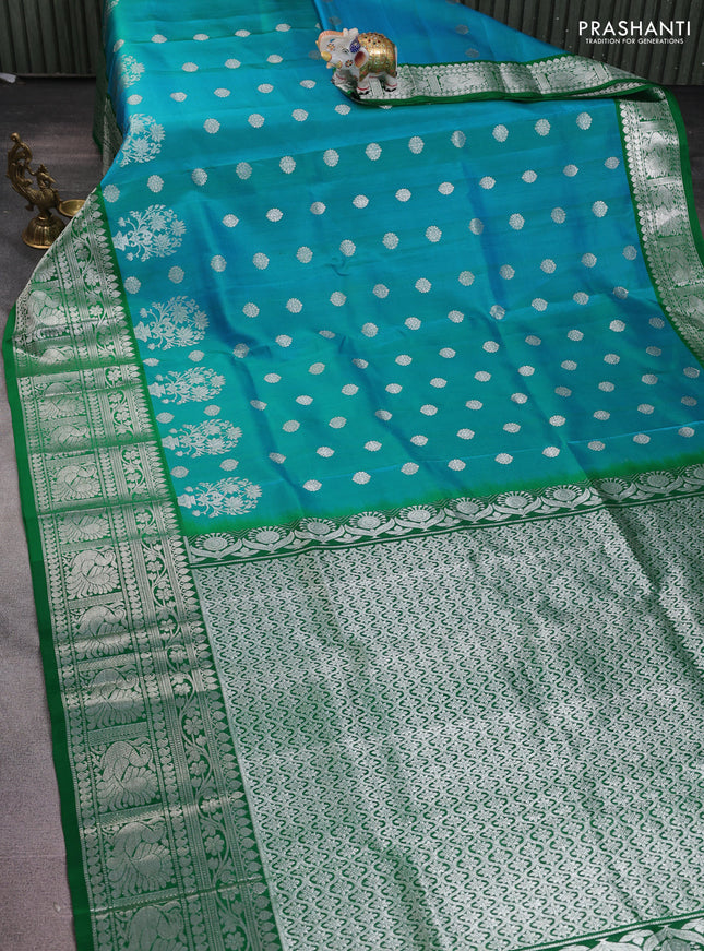Venkatagiri silk saree dual shade of teal blue and green with silver zari woven buttas and long silver zari woven border