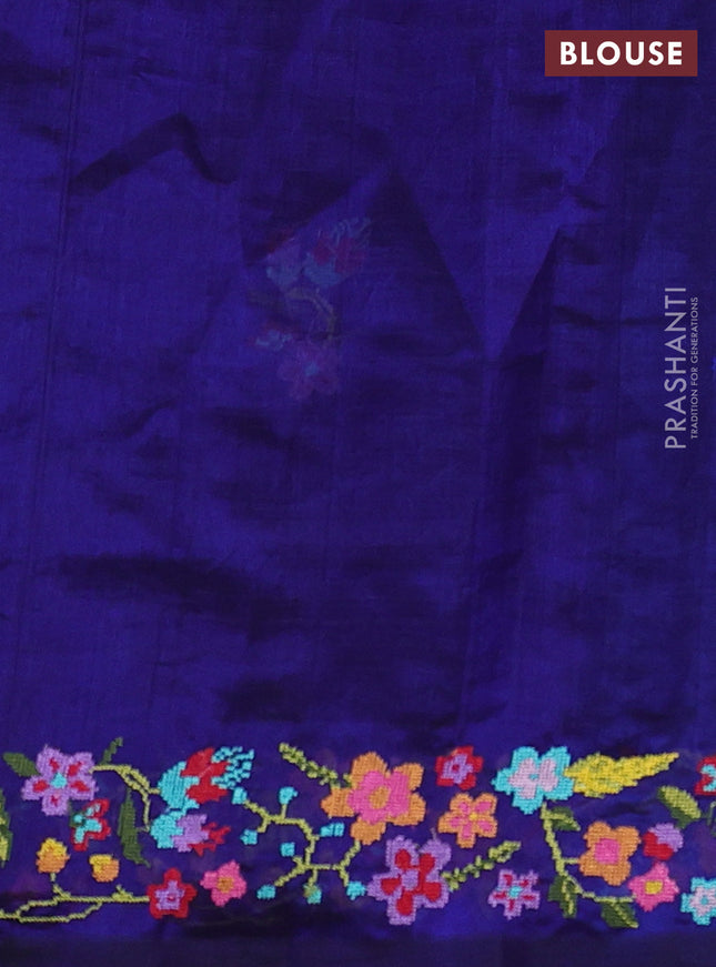 Silk cotton saree blue with floral embroidery buttas and embroidery border