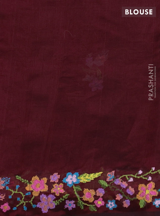 Silk cotton saree maroon with floral embroidery buttas and embroidery border