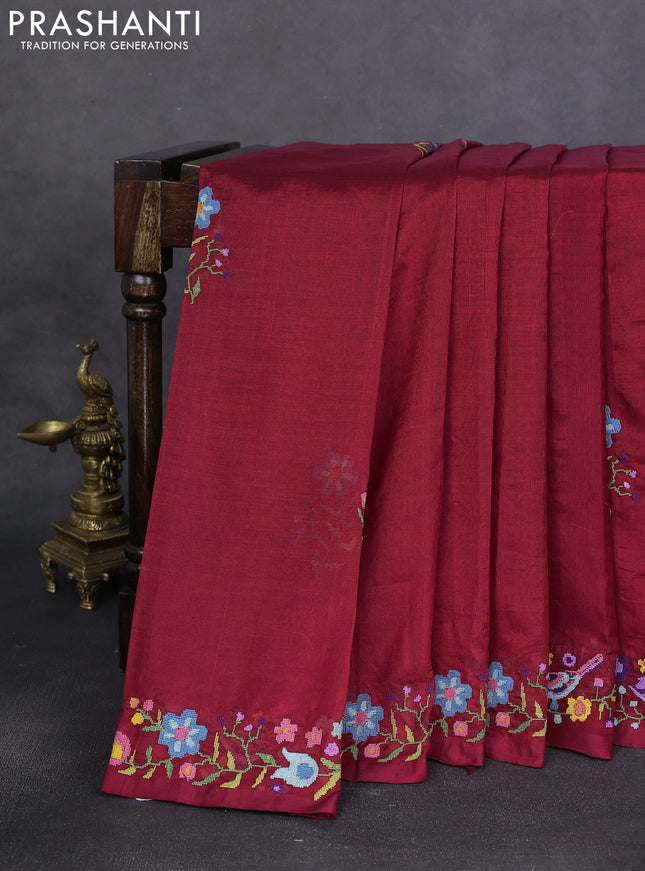 Silk cotton saree maroon with floral embroidery buttas and embroidery border
