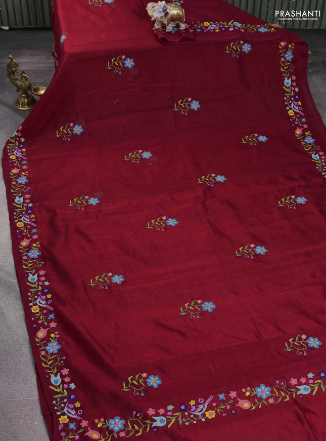 Silk cotton saree maroon with floral embroidery buttas and embroidery border