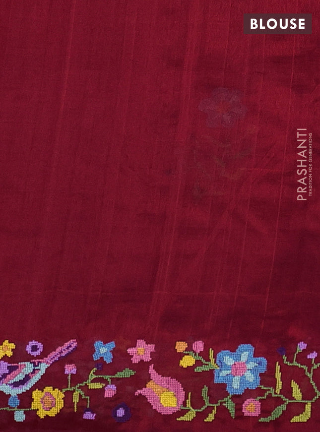 Silk cotton saree maroon with floral embroidery buttas and embroidery border