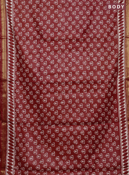Semi bhagalpuri saree rust with allover prints and zari woven border