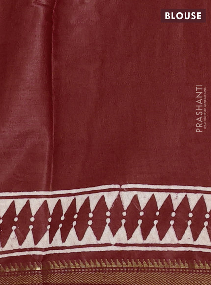 Semi bhagalpuri saree rust with allover prints and zari woven border