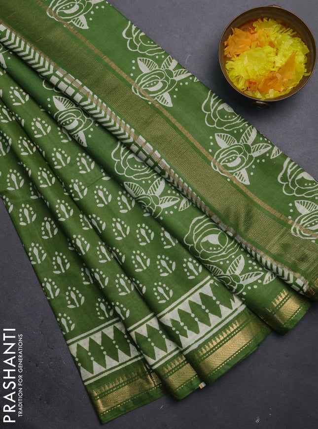 Semi bhagalpuri saree light green with allover prints and zari woven border