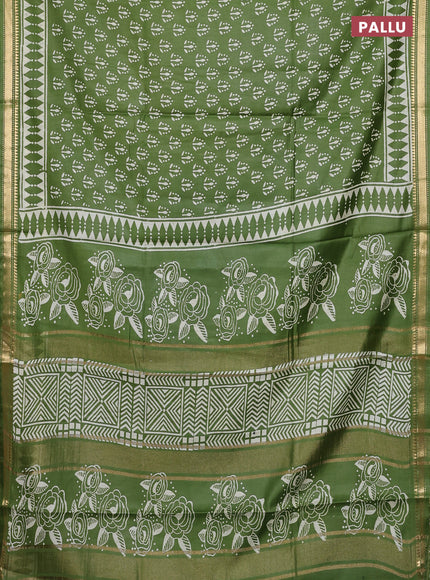 Semi bhagalpuri saree light green with allover prints and zari woven border