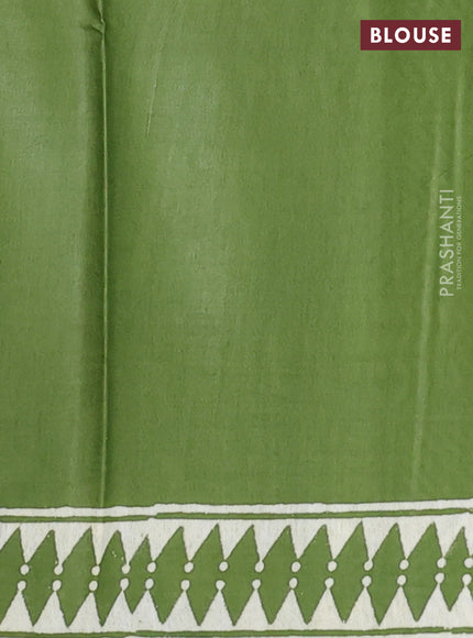 Semi bhagalpuri saree light green with allover prints and zari woven border
