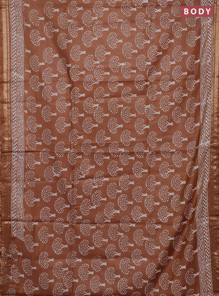 Semi bhagalpuri saree sandal with allover prints and zari woven border