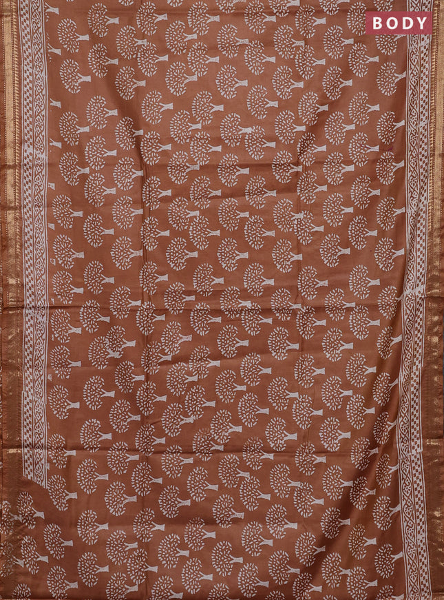 Semi bhagalpuri saree sandal with allover prints and zari woven border