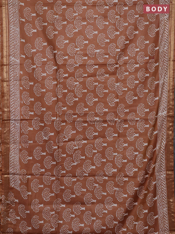 Semi bhagalpuri saree sandal with allover prints and zari woven border