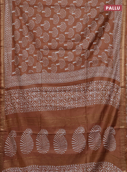 Semi bhagalpuri saree sandal with allover prints and zari woven border