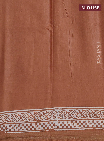 Semi bhagalpuri saree sandal with allover prints and zari woven border