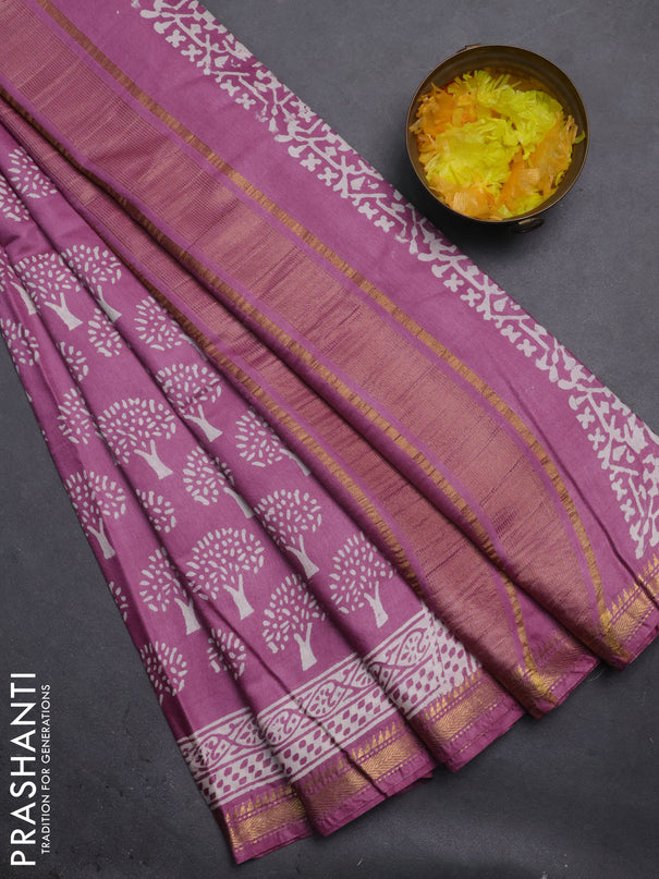 Semi bhagalpuri saree lavender with allover prints and zari woven border
