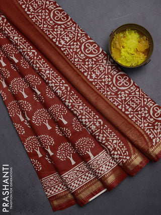 Semi bhagalpuri saree rust with allover prints and zari woven border