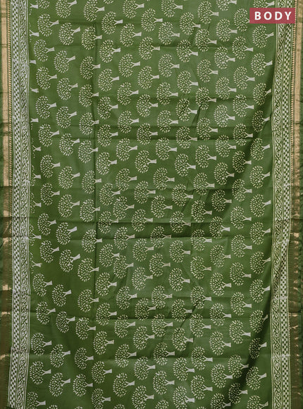 Semi bhagalpuri saree light green with allover prints and zari woven border
