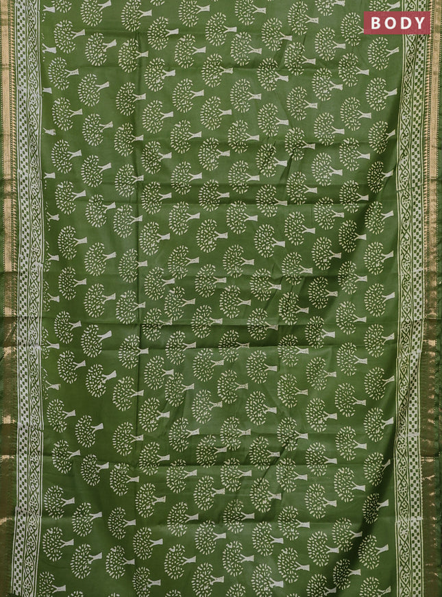 Semi bhagalpuri saree light green with allover prints and zari woven border